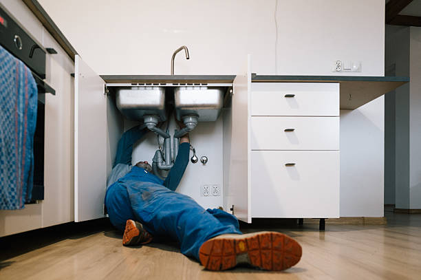Professional Emergency Plumber technician working in Rome City, IN